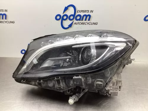 Koplamp links-